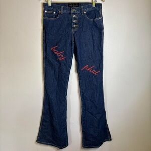 Baby Phat Dark Blue Flare Jeans with Red logo across the thighs sparkles